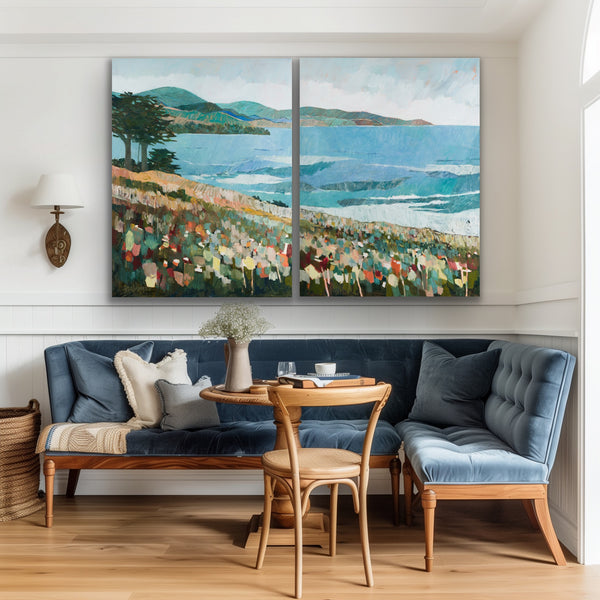 Living room with a large painting of a coastal scene above a blue sofa.