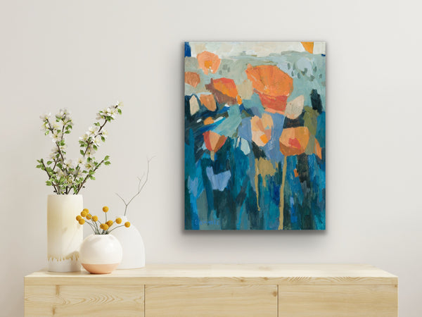 Abstract floral painting on a wall above a wooden console table with decorative vases.