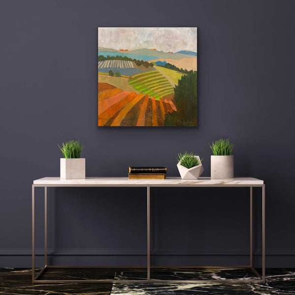 Colorful Painting of Vineyards above a table