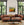 Contemporary painting of Vineyard in room above couch